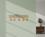 Unpainted MDF Love To Travel quote laser cut DIY wall decor key holder with airplane charms, mounted on wall