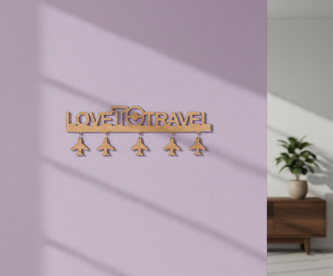 Unpainted MDF Love To Travel quote laser cut DIY wall decor key holder with airplane charms, mounted on wall