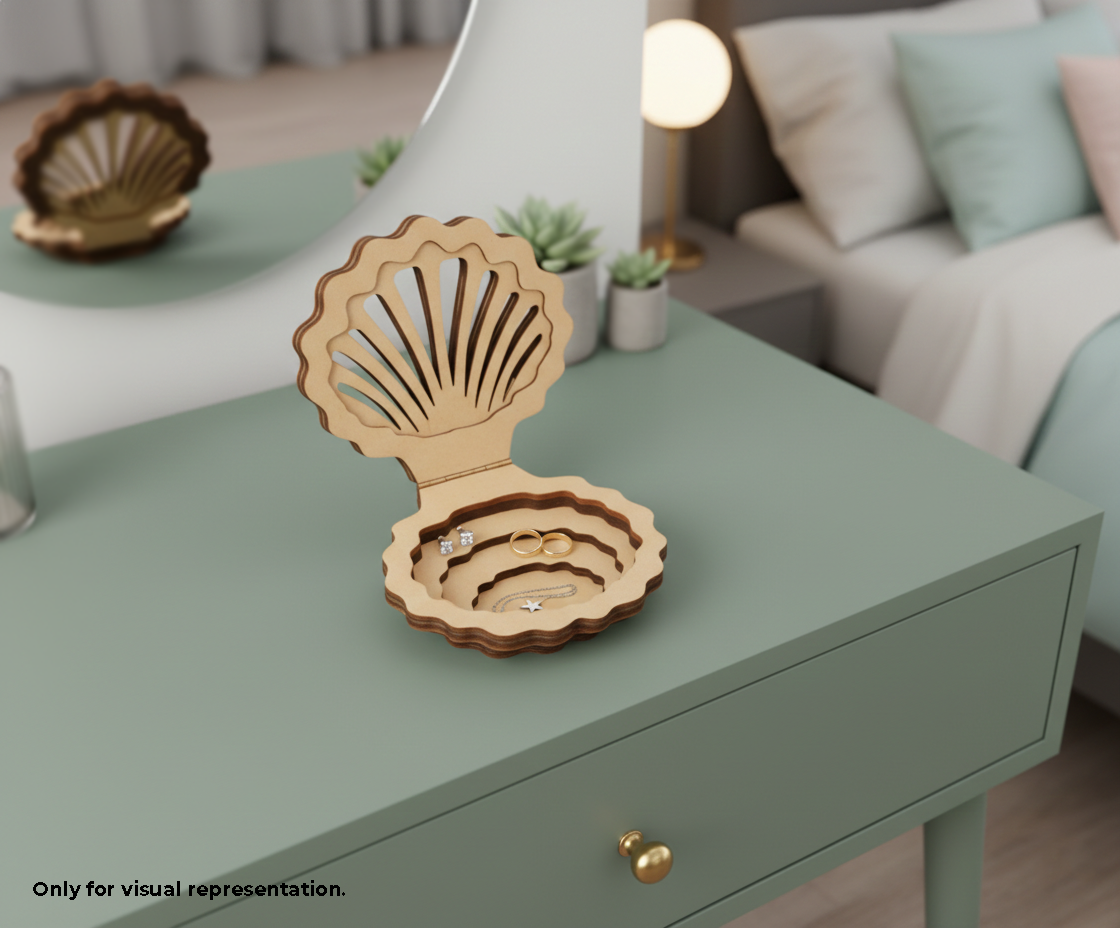  shell-shaped MDF DIY Jewellery Box on a green table with a blurred living room background