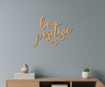 Unpainted MDF Be Positive quote laser cut DIY wall decor craft cutout, mounted on wall