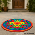 Painted round laser-cut MDF rangoli base with intricate floral and ornamental pattern design placed on floor