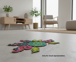 Painted MDF floral swirl rangoli cutout set with central round base surrounded by decorative swirl and leaf shapes placed on floor 
