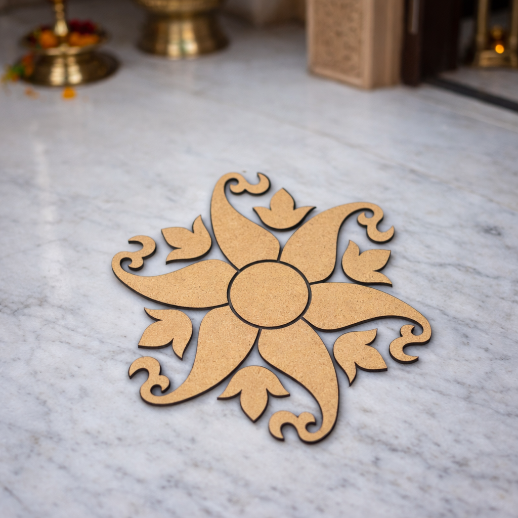 Decorative sun-shaped rangoli cutout on a marble surface