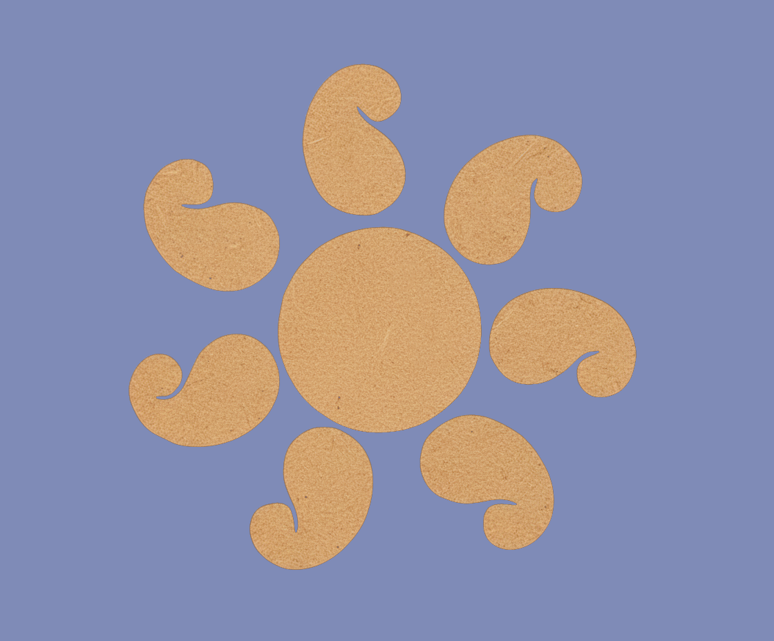 Unpainted MDF paisley rangoli cutout set with central round base and surrounding curved paisley shapes with  blue background 