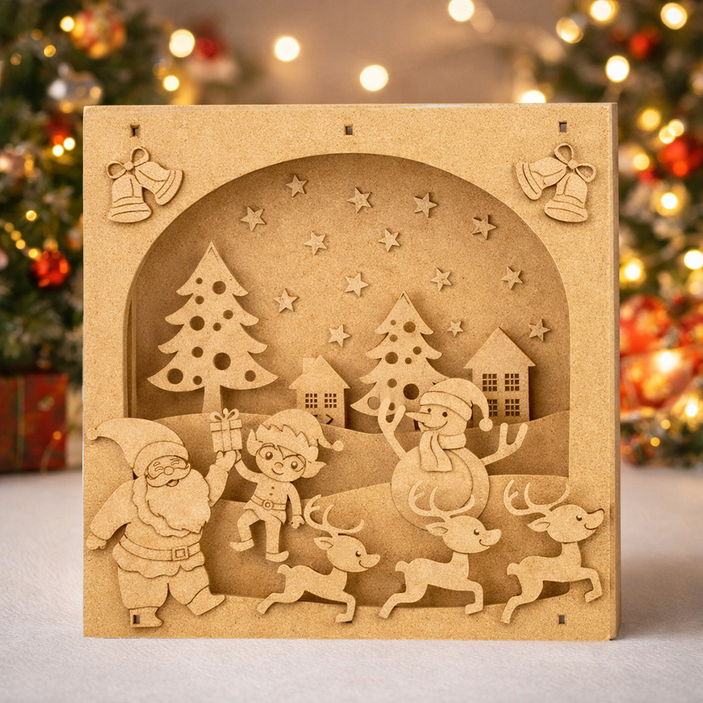 DIY MDF 3D Christmas shadow box scene with Santa, elf, reindeer, snowman and village, layered craft decor base standing on table 