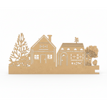 Unpainted MDF Christmas village scene cutout with two houses, trees, and fine laser details for DIY craft decoration.