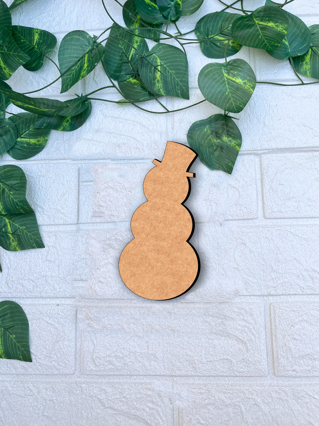 DIY MDF snowman cutout shape for Christmas craft decoration mount on white wall
