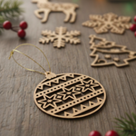 Laser-cut DIY MDF Christmas bauble cutout with star pattern, ornament show on decoration table 