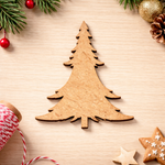 DIY MDF Christmas tree cutout for painting ,shown on decoration table 