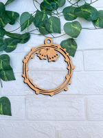 Laser-cut DIY MDF bell ring ornament cutout with hanging loop, Christmas craft mounted on wall