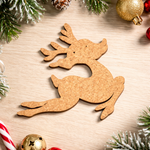 DIY MDF reindeer cutout for Christmas craft on decorative table