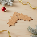 DIY MDF holly leaves cutout with berries for Christmas craft show on tabe 