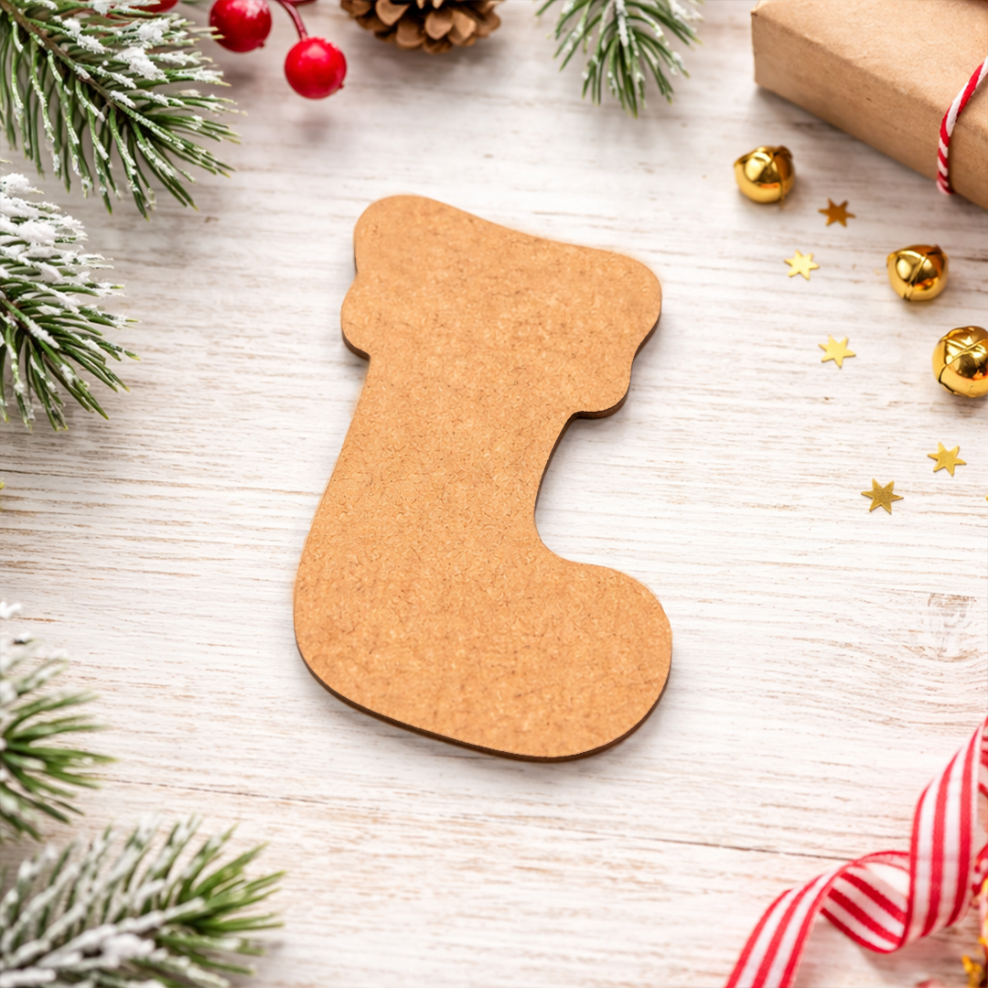 DIY MDF Christmas stocking cutout for craft and tree decoration show on table 