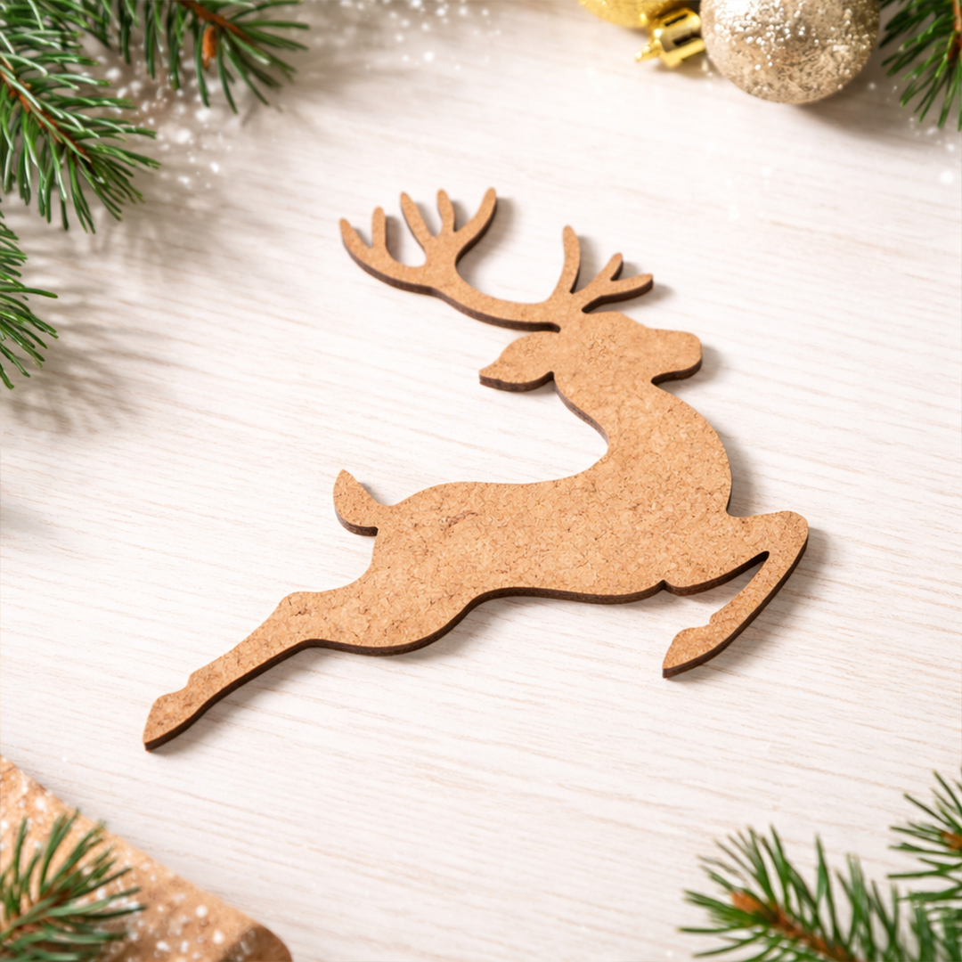 Unpainted MDF reindeer silhouette cutout in a leaping pose with antlers, displayed on table 