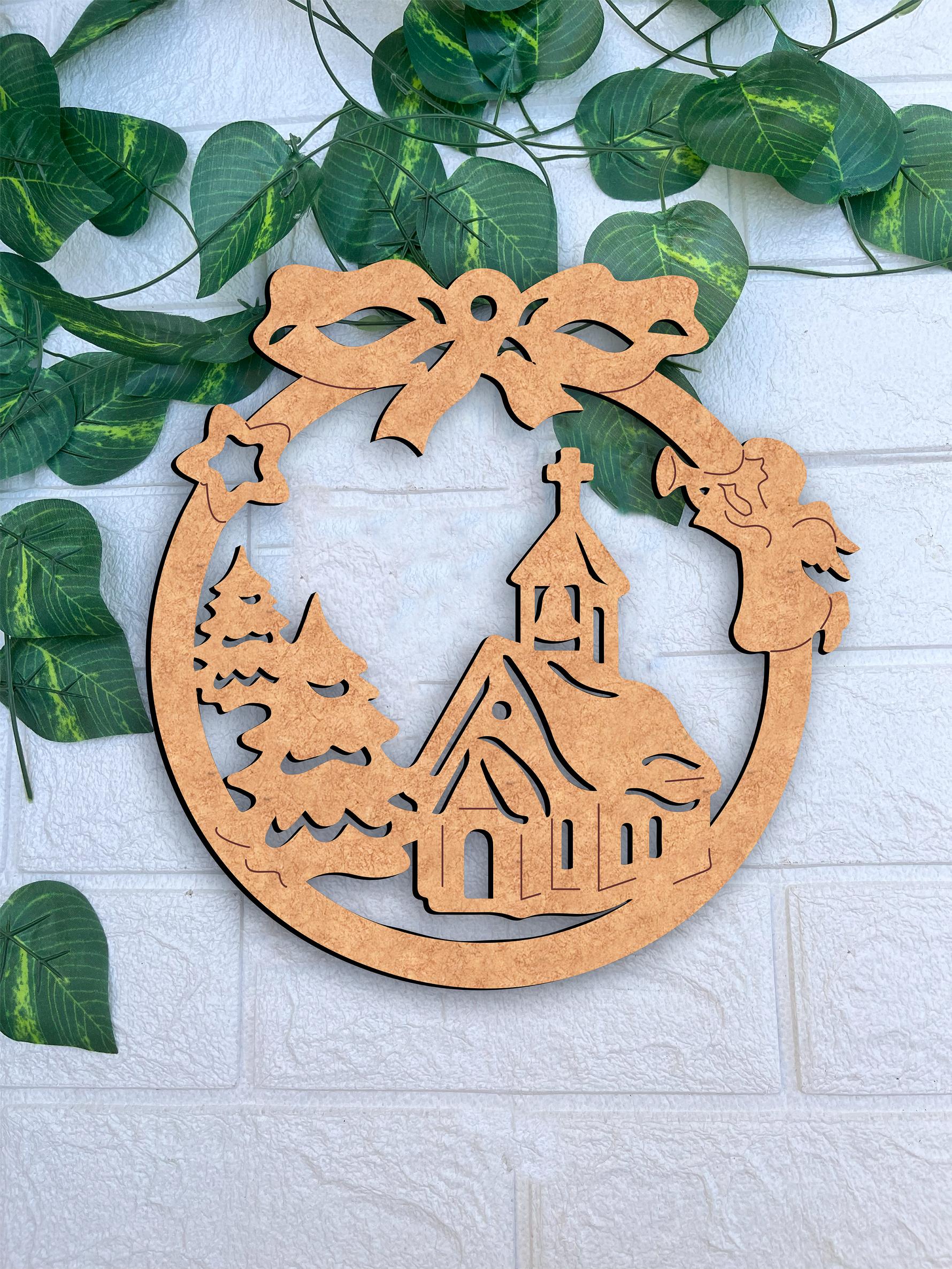 DIY MDF Christmas round ornament cutout with church, trees and angel design mount on white brick wall 
