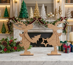  MDF DIY reindeer decorations on a festive Christmas setting with trees and presents.