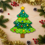 Colorful Christmas tree decoration on a MDF DIY board with festive elements.