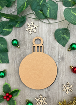DIY MDF blank Christmas bauble cutout ornament for craft show on decorative table 