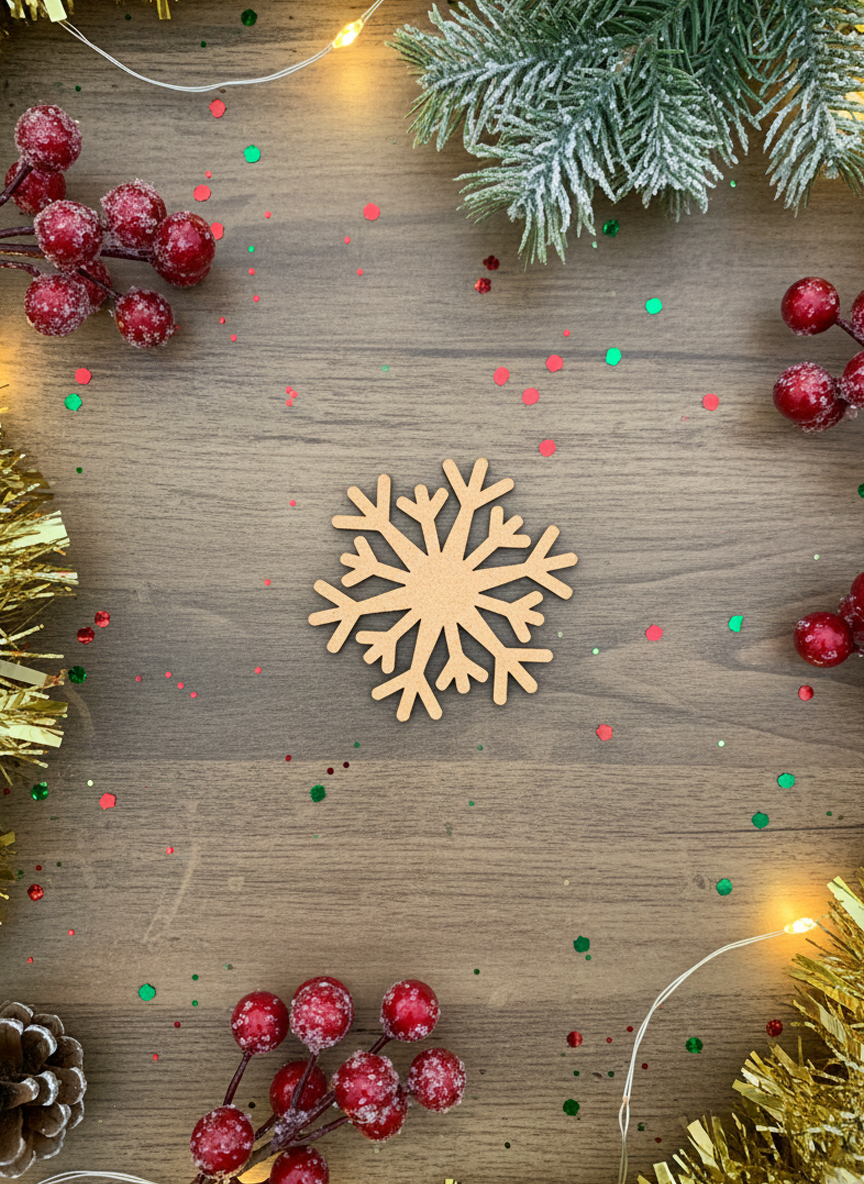 DIY MDF snowflake cutout set for Christmas craft on decorative table 