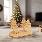 DIY MDF winter forest reindeer scene standing décor cutout for Christmas craft and painting show on wooden table 