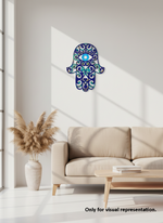 Decorative MDF DIY Hamsa wall art in a modern living room with a sofa and vase.