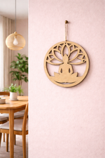 MDF DIY wall decor with a person sitting in a meditative pose on a pink wall.