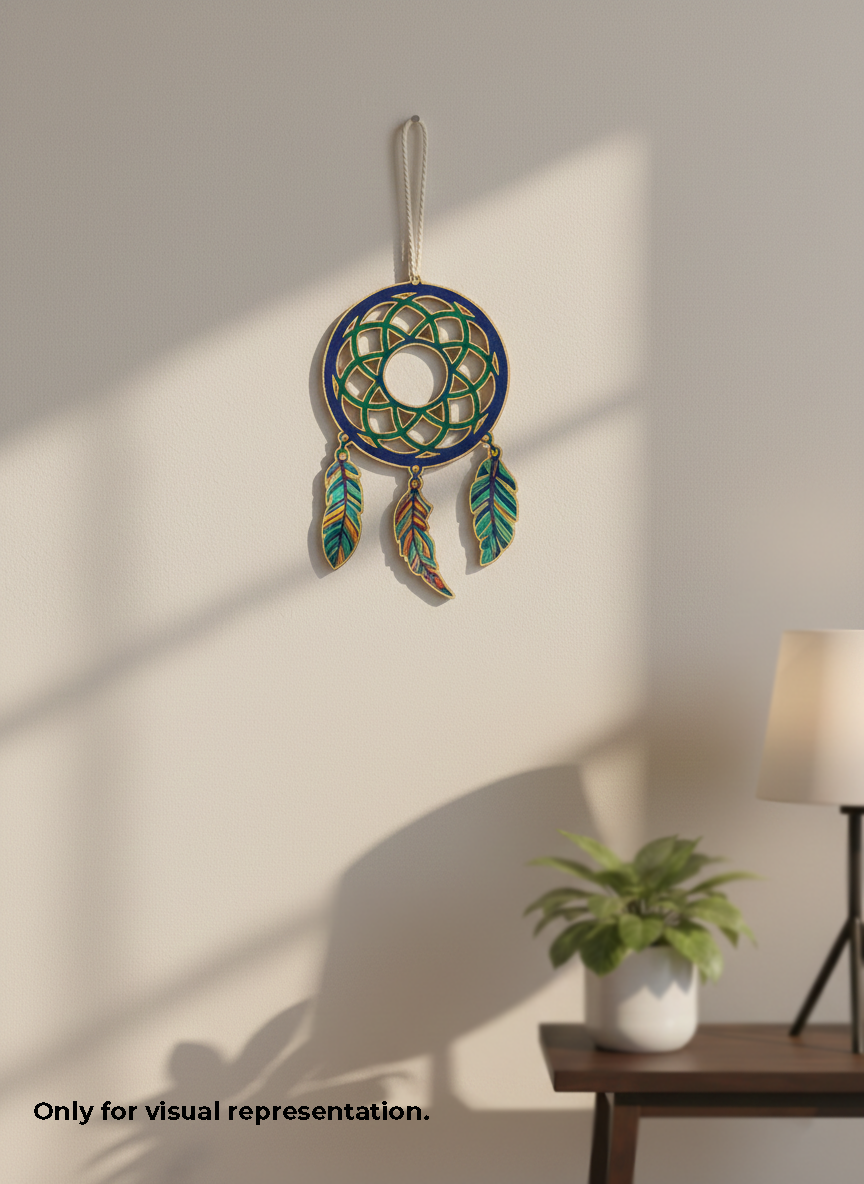 Decorative MDF DIY dreamcatcher hanging on a wall with a lamp and plant in the background.
