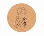 Round MDF DIY wall art with a black line drawing of a cow and palm tree on a white background
