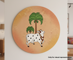 Decorative MDF DIY wall art with a cow and palm trees on a circular  frame.