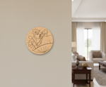 Decorative MDF DIY wall piece with a circular design on a beige wall in a living room.