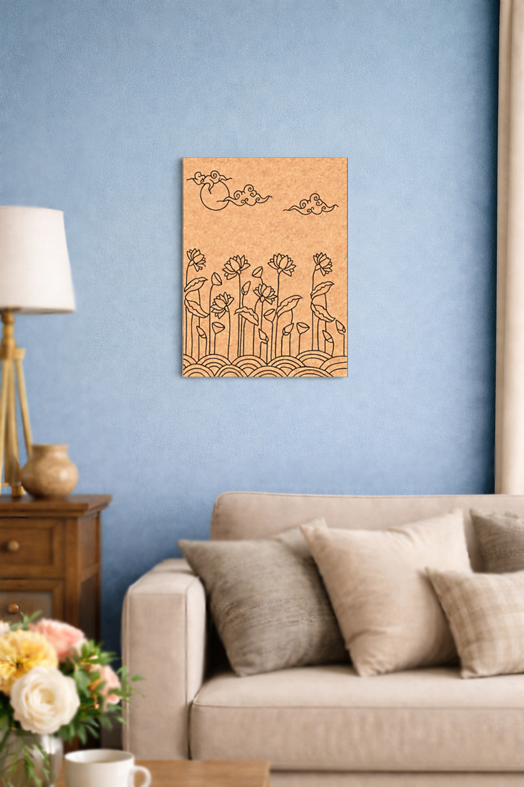 Decorative MDF DIY  wall art with floral design on a blue wall above a beige sofa.