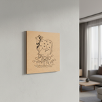 MDF DIY  wall art with a line drawing of a horse and flowers on a light gray wall.