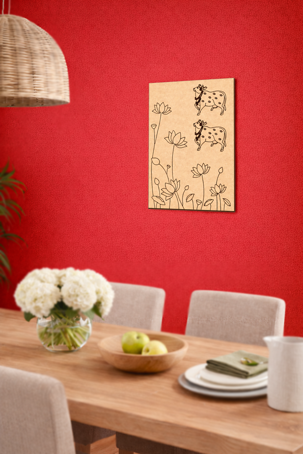 Dining room with a red wall, wooden table, chairs, and decorative elements.