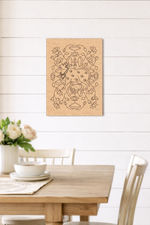 MDF DIY  wall art with deer design above a wooden dining table with flowers and plates.