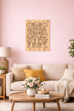 Living room with a pink wall, white sofa, and decorative elements.