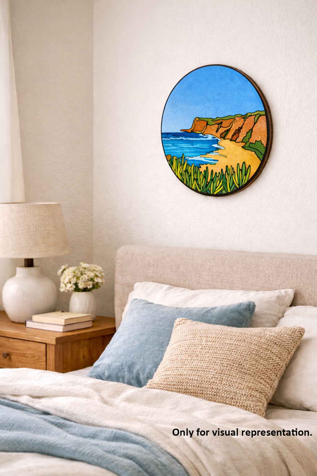 Bedroom with a round wall art piece depicting a beach scene.