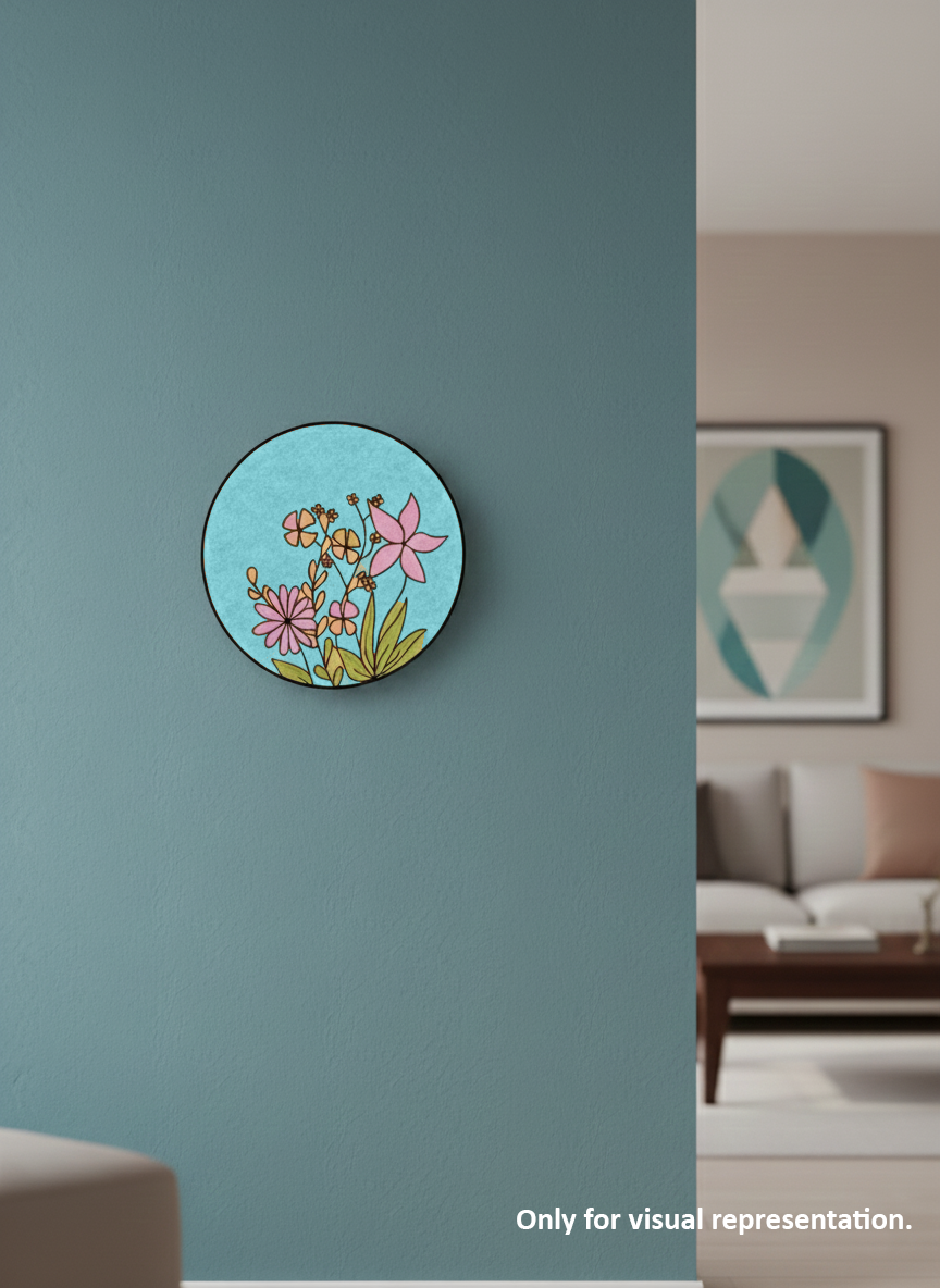 Decorative circular wall art with floral design on a teal wall, living room setting.