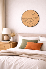 Bedroom with a round MDF DIY wall art piece above the bed