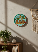 Hand-painted MDF owl wall art with colorful design on white wall.