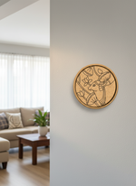 MDF wall art with cow and lotus leaves design on light gray wall near living room.