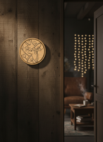 MDF cow design wall décor on rustic wooden panel in cozy, warm-lit room.