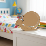 DIY MDF snail-shaped Money Bank on a dresser in a child's room with colorful bedding and books.
