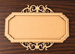 Ornate rectangular MDF platter with scroll-cut design on dark wooden background.