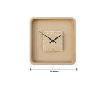 Beige square Shadow wall clock with black hands on a white background