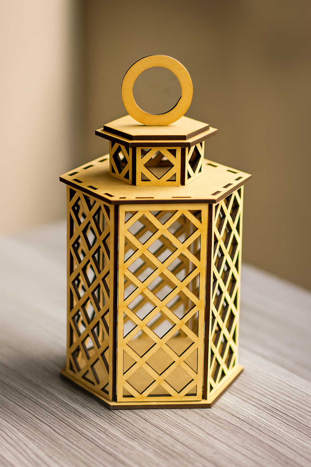 MDF hexagonal lantern with lattice cutouts and ring handle

