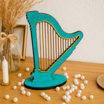 Teal MDF harp table décor with gold bead detailing