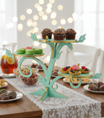 Mint green MDF dessert stand with pearl detailing, holding colorful desserts and pastries