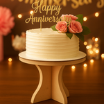 Unpainted MDF cake stand with anniversary cake and pink floral topper, romantic setup