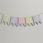 Blue and yellow birthday banner spelling LAKSH