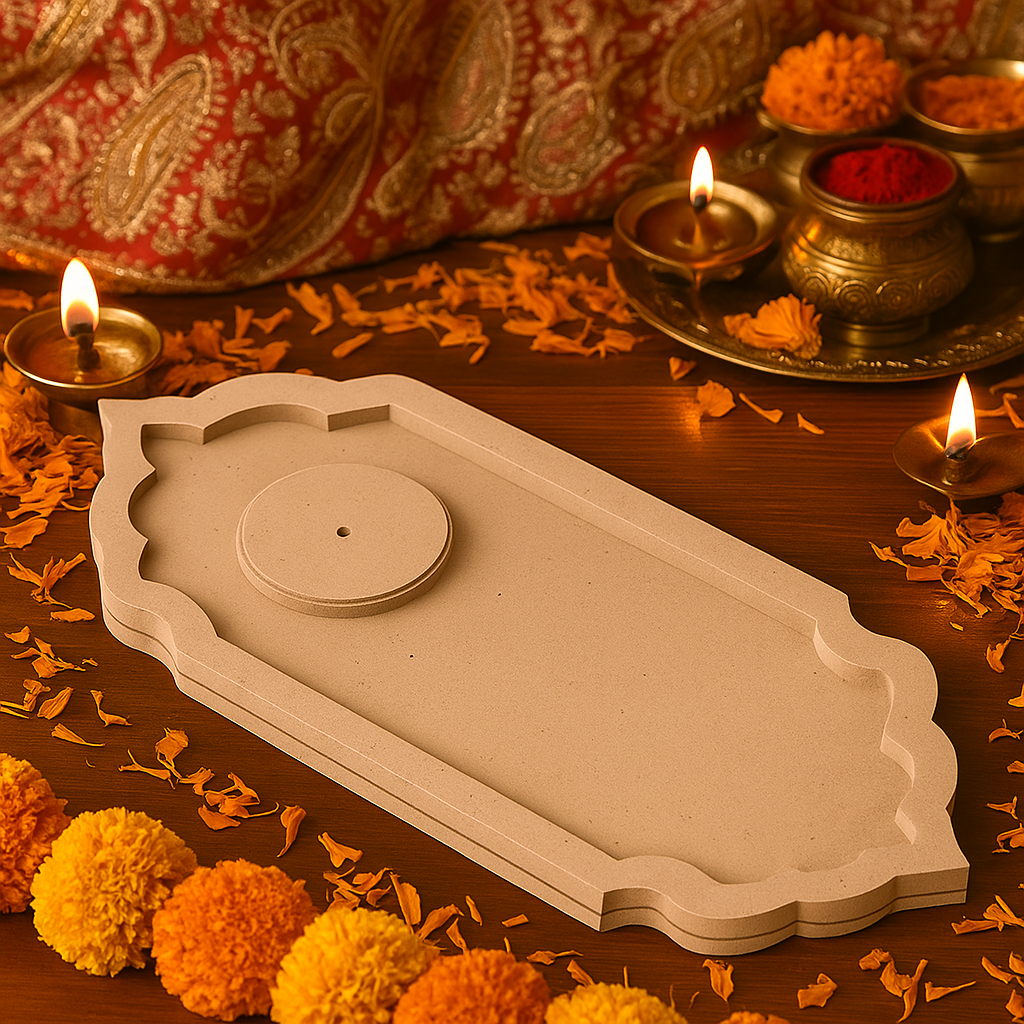 MDF pooja platter surrounded by flowers and lit diyas on wooden pooja setup.